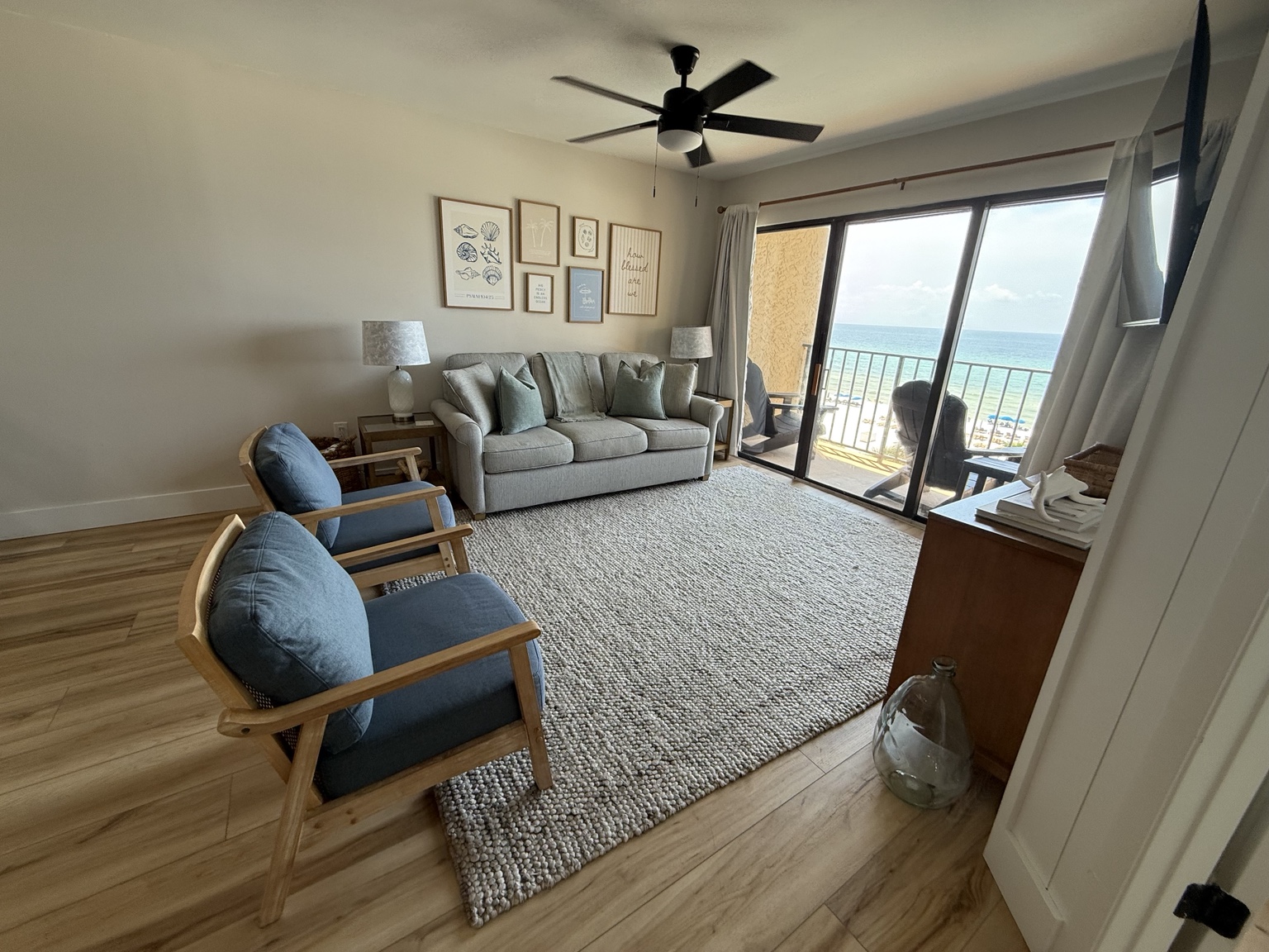Guest-ready coastal living room with an ocean view