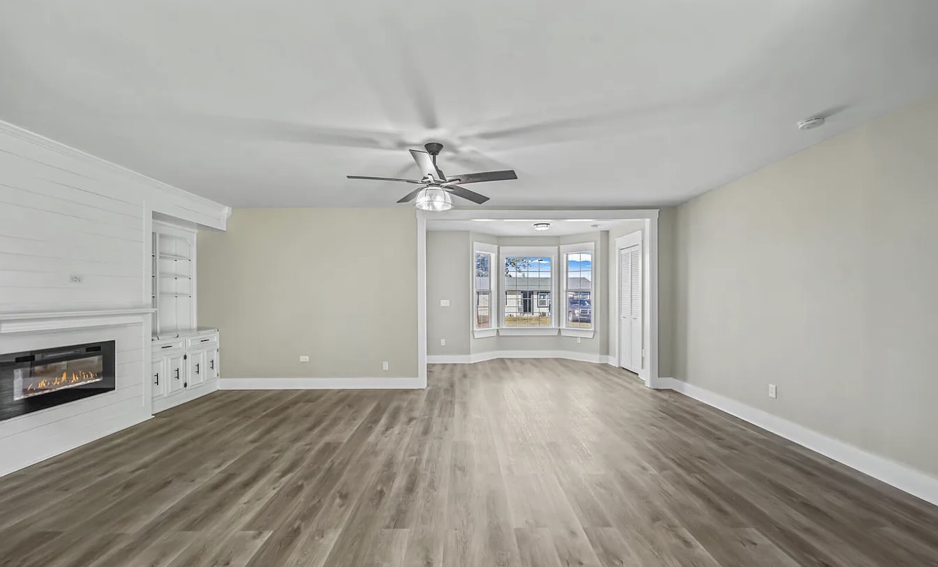 Finished flooring throughout remodeled living space